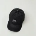 Classic dark denim children's baseball cap close-up showcasing neat white embroidery detail. - 2-8 Years (Head Circumference 49-53cm) / Black