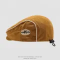 Kids cotton beret hat in khaki with contrast piping and adjustable drawstring for toddlers. - 50cm Adjustable Fit For 1-3 Years / Side K Letter - Dark Yellow
