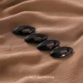 4 Stück schwarze Kunststoff hohle Schalclips und Broschennadeln für Damen Accessoires. - 4er Pack / Schwarz
