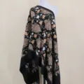 Detailed view of black cashmere-feel ethnic embroidered shawl, exquisite floral pattern scarf. - Black
