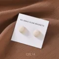 Round matte beige magnetic hijab magnets detail view, simple scarf pins set with card. - COL.14 Off-White