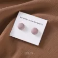 Matte finish pink magnetic hijab pins detail shot, showing smooth round button design and backing card. - COL.19 Rose