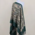 Dark green cashmere-feel shawl with elegant gold paisley embroidery and chic fringe trim. - Dark Green