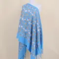 Blue embroidered cashmere feel scarf variant with floral design and fringe edges for warmth. - Sky Blue