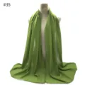Green chiffon scarf detail view, elegant solid color hijab material close up for women. - #35 Pattern