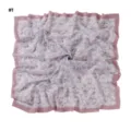 Floral print square scarf detail, pink wavy laser-cut edge hijab shawl closeup. - Pattern #1