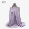 Close-up view of the light purple TR cotton crinkled hijab scarf texture and tassel edge detail. - Style 28
