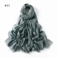 Detail of metallic viscose scarf fringe texture and shimmering glitter weave surface. - Dusty Mint