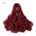 Close-up detail of a dark red glitter viscose cotton linen scarf draped elegantly on display. - 20#