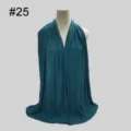 Detail view of the soft modal jersey hijab scarf, showing the fine texture and elegant drape. - No.25 Teal