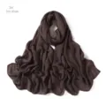 Detail view of the lightweight modal scarf in dark khaki, showing soft texture and fine edges. - Dark Khaki