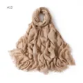 Detail view of lightweight modal cotton scarf texture with fringe tassels in solid beige color. - #12 Beige