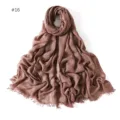 Detailed view of the lightweight solid color modal cotton scarf with neat fringe edges. - #16 Tan