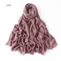 Close-up detail of soft modal cotton scarf with short tassels in elegant mauve color. - #18 Grey Pink