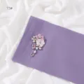 Detail of solid color purple chiffon scarf featuring handmade rhinestone flower brooch embellishment. - 15# / 1.8m