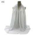 Detail view of solid white chiffon hijab scarf draped on mannequin torso, soft and lightweight. - #55