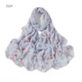 Vista dettagliata della sciarpa in chiffon floreale azzurro, tessuto leggero e design elegante. - 252#