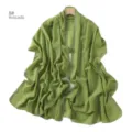 Detailed view of avocado green chiffon scarf featuring sparkling rhinestone trim. - 8#
