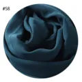 Detailansicht des dunkelblauen Bubble-Chiffon-Hijab-Stoffes mit weicher Textur als Muster 58 - #58 Tintenblau