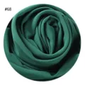 Dunkelgrüner Perlen-Chiffon Hijab Stoff Detail mit weicher Textur und unifarbenem Design. - #68 Dunkelgrün