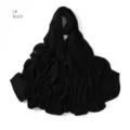 Detailed view of the black pleated stretchy jersey hijab scarf, soft breathable texture. - Black