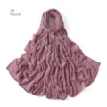 Detailed view of the crinkled stretch jersey hijab in mauve, showing delicate pleats and texture. - Lotus Pink