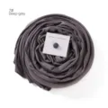 Detailed view of the dark grey mercerized cotton hijab scarf with a magnetic pin card. - Dark Gray