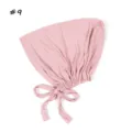 Modal zachte ademende elastische strikmuts effen kleur hoofddeksel detailweergave. - Roze
