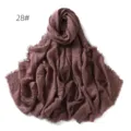 Solid color cotton linen scarf detail showing soft textured fabric and delicate fringe edge. - Lotus Pink