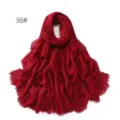 Solid color cotton linen scarf detail showing breathable texture and delicate fringe edge. - Red