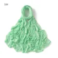 Solid color modal jersey hijab scarf detail view, soft lightweight fabric in light green. - Light Green