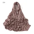 Detailed view of solid color modal jersey hijab scarf, soft drape fabric, elegant wear. - Lotus root pink