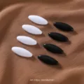 Close-up of black and white magnetic hijab pins set, 8 pieces, durable plastic smooth design. - Group 3 Black & White