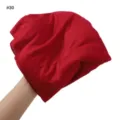 Detailed view of soft red jersey modal scarf fabric, breathable textile turban closeup. - Burgundy