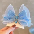 Fermaglio per capelli in tulle blu con ciondolo a cuore di cristallo, dolce accessorio - Molla per Capelli con Fiocco 3D Principessa (X1-529) / 1 Pezzo / Blu
