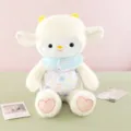 Jolie peluche mouton douce avec cornes jaunes et bavoir bleu cadeau idéal pour les enfants - Agneau / 25cm