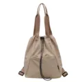 Multi-functional canvas backpack for women, casual drawstring bucket bag in solid khaki. - Off White