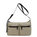 Casual beige nylon crossbody bag with dual front pockets and black strap for daily commute. - 31x10x21cm / Khaki