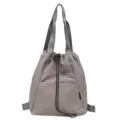Versatile grey drawstring backpack and shoulder bag for women, casual daily tote design. - Gray