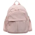 Pink nylon mini backpack for women, casual daily commuter school bag with front pocket. - 25x14x30cm / Pink