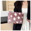 Plush laptop sleeve detail featuring a cozy star pattern and soft texture for daily use. - 11" / Burgundy