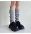 Grey wool knit leg warmers with black platform shoes, simple winter casual style for women. - Light Gray
