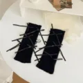 Black knitted leg warmers with multiple ribbon bows, sweet Lolita style knit socks for women. - One Size / Black