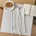 White knitted leg warmers with ribbon ties, sweet Japanese style cute socks flat lay view. - One Size / White