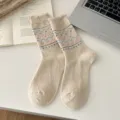 Nordic style wool blend mid-tube socks featuring cute heart and bow patterns for women. - Cream Bow