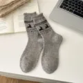 Cozy Nordic style wool blend mid-tube socks featuring cute reindeer and snowflake patterns. - Light Grey Reindeer