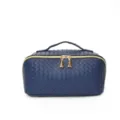 Donkerblauwe geweven cosmetische tas met handvat en stijlvolle gouden ritssluiting. - Marineblauw