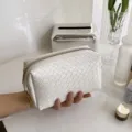 Witte geweven lederen cosmetische tas draagbare clutch handtas stijlvolle make-up etui - Wit