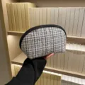 Black and white tweed half-moon cosmetic bag, portable travel makeup storage pouch for daily use. - Off White