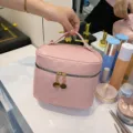 Pink PU leather portable makeup bag, stylish checkerboard pattern toiletry storage organizer. - Pink